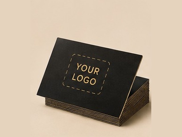 Branded business cards with a full logo placeholder
